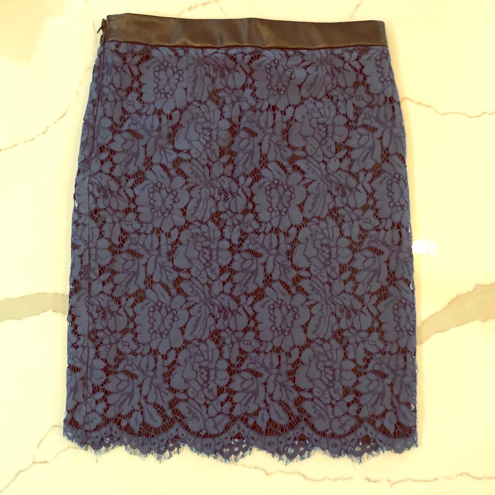 Blue lace pencil skirt with leather top hem